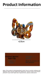 Detailed view of a 2.5cm acetic butterfly hair claw with tortoiseshell pattern finish