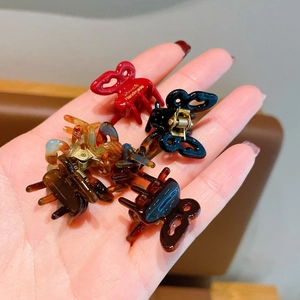 Mini butterfly acetate hair claw clips in various colors for women's side hairstyles