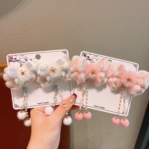 Winter floral butterfly hair clips for girls with fur trim and pink tassel charms