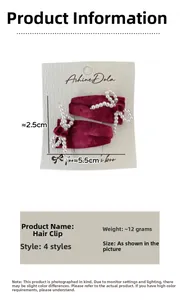 Dettaglio di fermagli in velluto rosso con fiocchi di perle e dimensioni specifiche