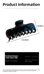 Detailed view of large black acrylic hair claw clip with size measurements 11.5cm by 4.5cm