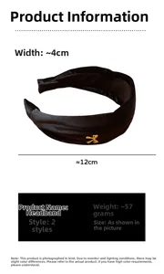Detail view of 4cm wide black velvet headband with elegant gold bow metal accent