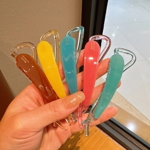 Set di cinque fermagli a banana colorati stile francese con scritte dorate eleganti