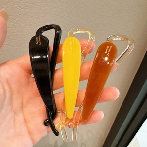 Set di tre fermagli a banana francesi minimalisti nei colori nero, giallo e ambra lucido