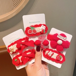 Cute red knitted bow hair clips for girls featuring cherry and bunny designs
