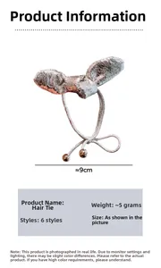 Dettaglio di un elastico per capelli metallico argento con dimensioni 9cm e peso 5g