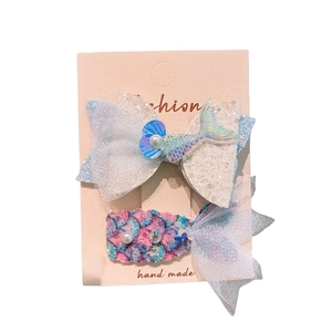 Glittery mermaid hair clip set with sequin fishtails and pearls for girls