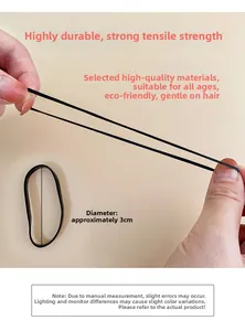 Elastic black hair ties showing strong stretch durability and a 3cm diameter size