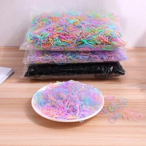 Bulk packs of high-elasticity colorful and black hair ties in clear zipper bags
