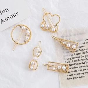 Set of five golden hairpins featuring white pearls and crystals in geometric shapes