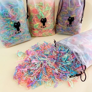 Colorful elastic hair bands for kids in a transparent cat pattern drawstring pouch
