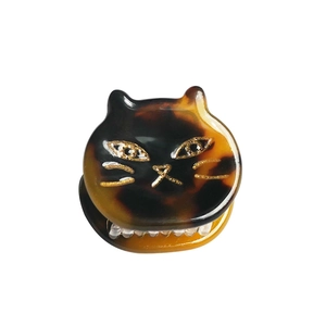 Mini tortoiseshell cat hair claw clip made of acetate with gold glitter cat whiskers