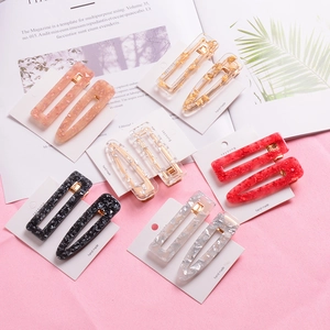 12-piece set of acetate hair clips with gold foil in rectangular and waterdrop shapes