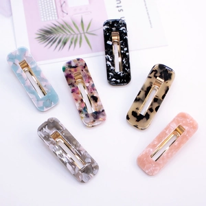 Set of 6 colorful acetate hair clips in rectangular hollow designs with leopard patterns