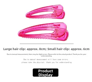 Vue détaillée de pinces à cheveux roses en tailles 8cm et 6cm avec ressort en métal
