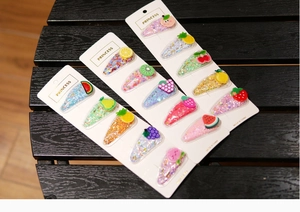 Set of 14 colorful fruit sequin hair clips for girls including peach watermelon and grape