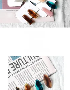 Detailed close-up of colorful translucent resin hair clips with elegant metal fasteners