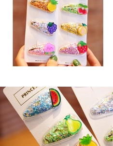 Detail of glittery fruit hair clips set with colorful sequins in transparent acrylic case
