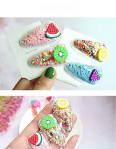 Détail de barrettes à cheveux fruits avec paillettes liquides pour enfants