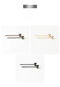 Détails macro des barrettes à cheveux ours en trois couleurs : marron, beige et noir