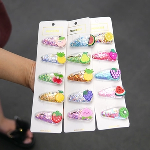 Set of colorful sequin hair clips for kids with cute rubber fruit charms in vivid colors