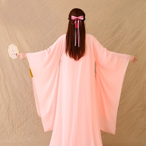 Detail view of pink Hanfu chiffon robe with long flowing sleeves and floral silk ribbons