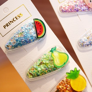 Colorful sequin fruit hair clips for girls including watermelon and pineapple shapes