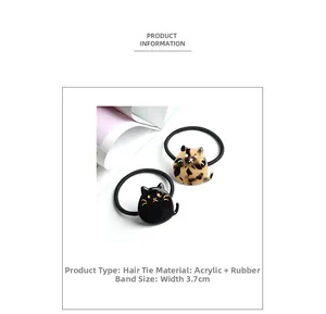 Détails d'élastiques chat en noir et léopard avec breloques en acrylique de 3,7 cm