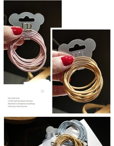 Detail view of colorful high-elastic braided hair ties with cute bear tag packaging