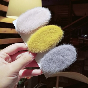 Three-piece fluffy rabbit fur BB hair clips in pink, yellow, and grey for women