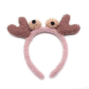 Serre-tête peluche rose avec yeux de dessin animé drôles et pinces de crabe brunes