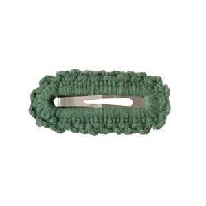 Handmade dark green knitted hair clip with scalloped edges and silver metal snap button
