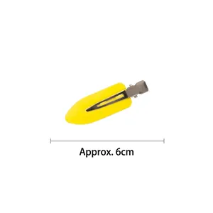 Bright yellow seamless hair clip with silver metal base, 6cm length minimalist design