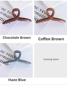 Glossy cross hair claws in chocolate, coffee and haze blue colors on white surface
