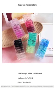 Macro detail of high-elastic spiral telephone wire hair ties in a clear gift box