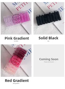 Detailed view of colorful spiral phone cord hair ties in transparent storage boxes
