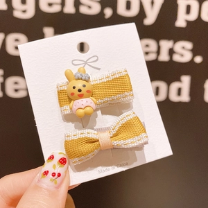 Cute yellow striped hair clips set with cartoon rabbit doll on display card for girls