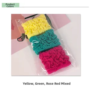 Close-up of three high-elastic bubble hair ties in yellow, green, and rose red colors