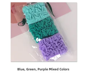 Macro detail of blue, green, and purple bubble texture elastic hair scrunchies set