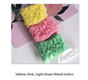 Three elastic bubble hair ties in yellow, pink and green colors in clear packaging