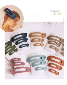 Detail of Morandi-colored matte resin hair clip set in various sizes and tones