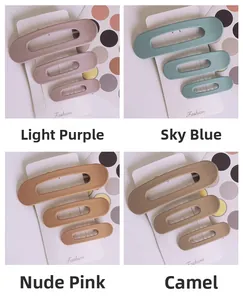 Set of large matte hair clips in lavender, blue, pink, and camel on white card