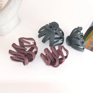 Set of 4 large matte hair claws in dark purple and emerald green for elegant hair styling
