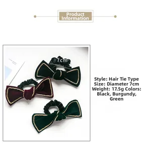 Detail view of velvet bow hair ties in black, burgundy, and green with 7cm diameter size