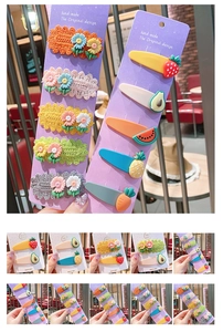 Detailed set of handmade crochet flower and colorful fruit hair clips for women
