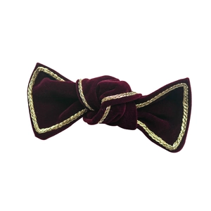 Elegant wine red velvet bow hair clip with gold braided trim in retro british style