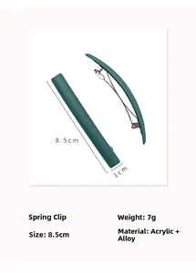 Détail de la pince à cheveux vert mat montrant la longueur de 8,5 cm et l'alliage