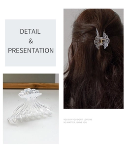 Detail of transparent jellyfish hair claw clip showcasing its petal texture on hair