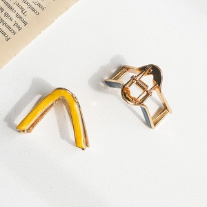 Elegant V-shaped metal hair claw clips set in yellow and dark gray with gold finish
