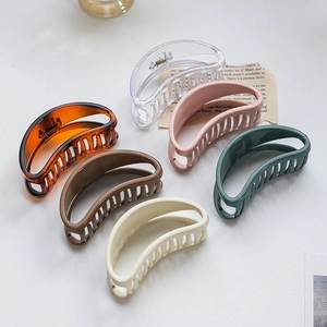 Minimalist large crescent hair claw clips set in six assorted colors on a white background
